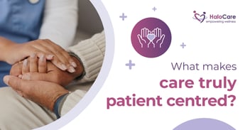 carer holding hands with elderly man